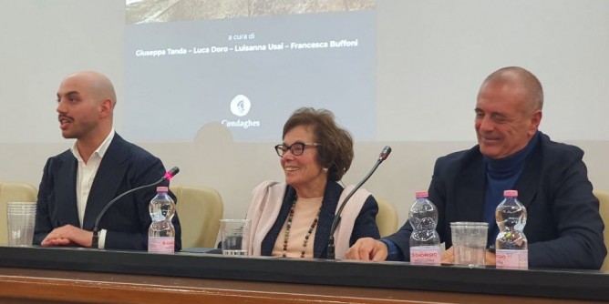 Di Gangi-Cocco: impegno e visione. Domus de janas, Alghero capofila
