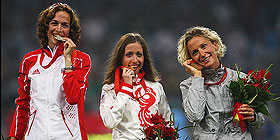 Olimpiadi, Day 13: Marcia di Bronzo